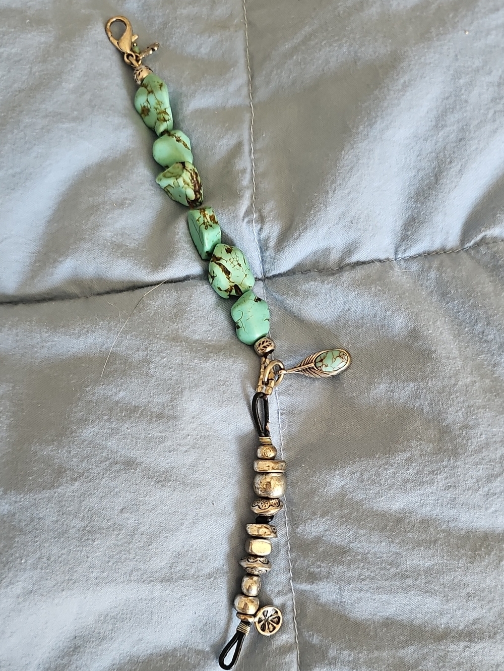 Faux Turquoise and silver Bead Bracelet with charms